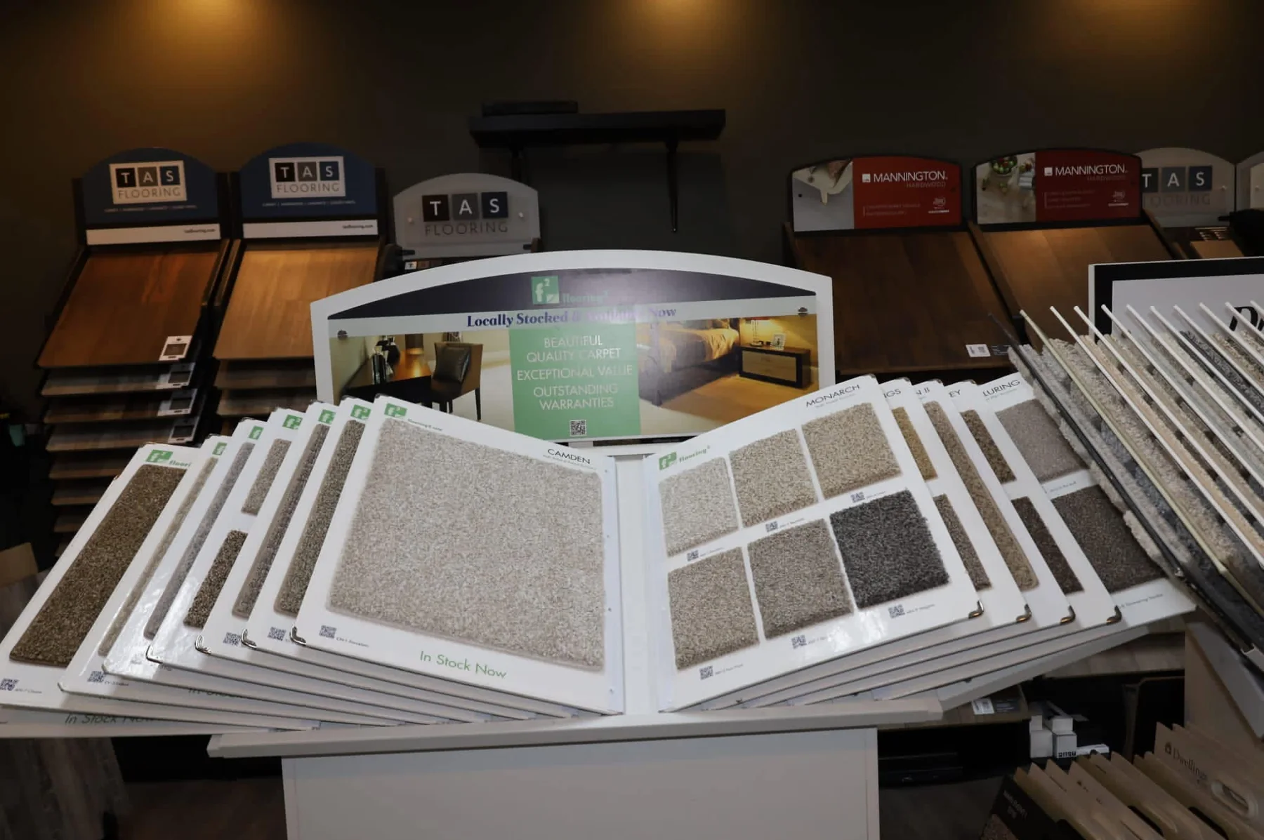 Carpet sample fan display inside the JRC Flooring showroom.