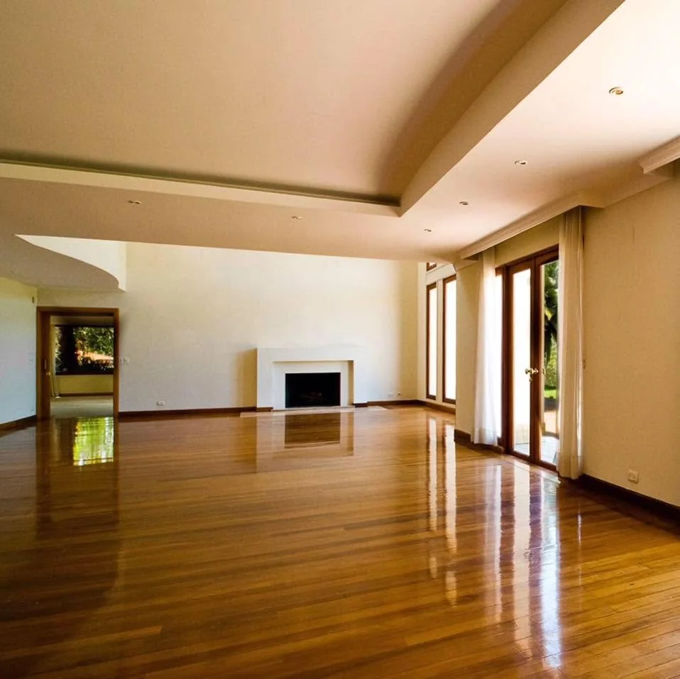 Open living room hardwood install by JRC Flooring.